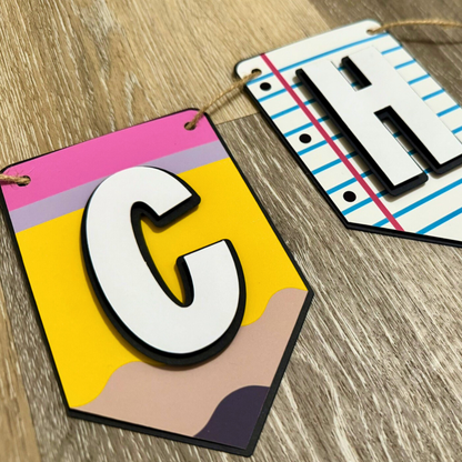 Colorful letter 'C' on a wooden surface
